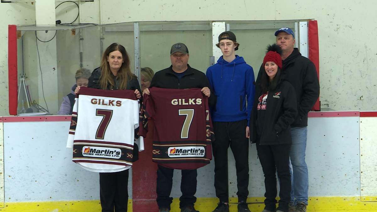 From left to right: Kevin King, president of Keswick Minor Hockey, Jennifer Hurley, president of Stanley Minor Hockey, David Gilks, Harrison’s brother, and parents Sonya Gilks and Trevor Gilks.
