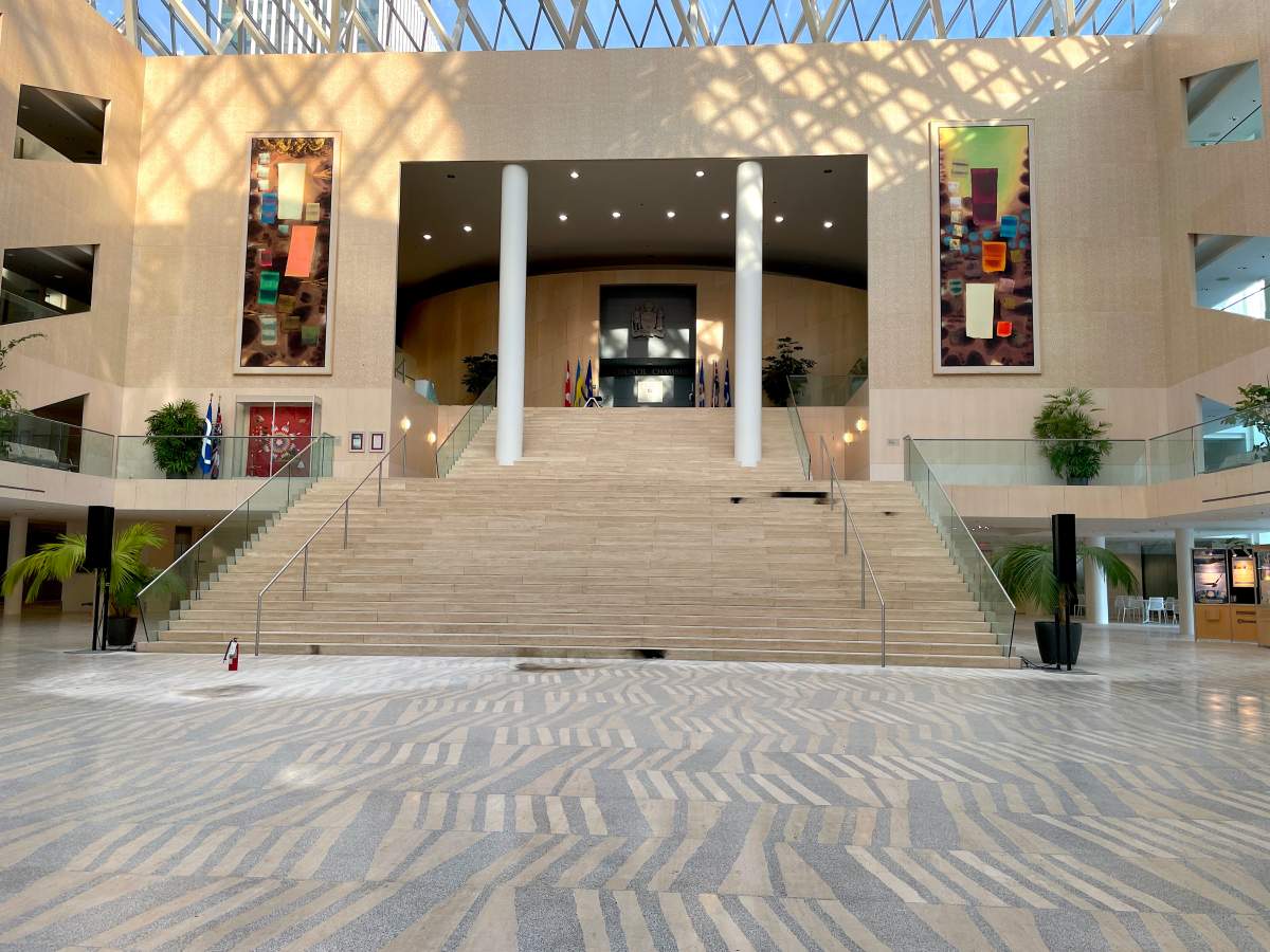 Restoration crews work to repair damage inside Edmonton City Hall Wednesday, Jan. 24, 2024, one day after a shooting inside the building.