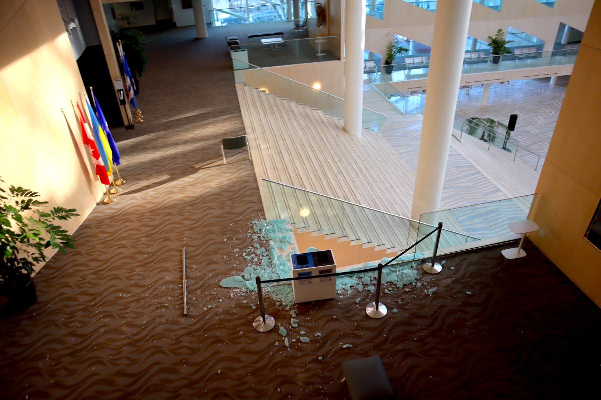 Restoration crews work to repair damage inside Edmonton City Hall Wednesday, Jan. 24, 2024, one day after a shooting inside the building.