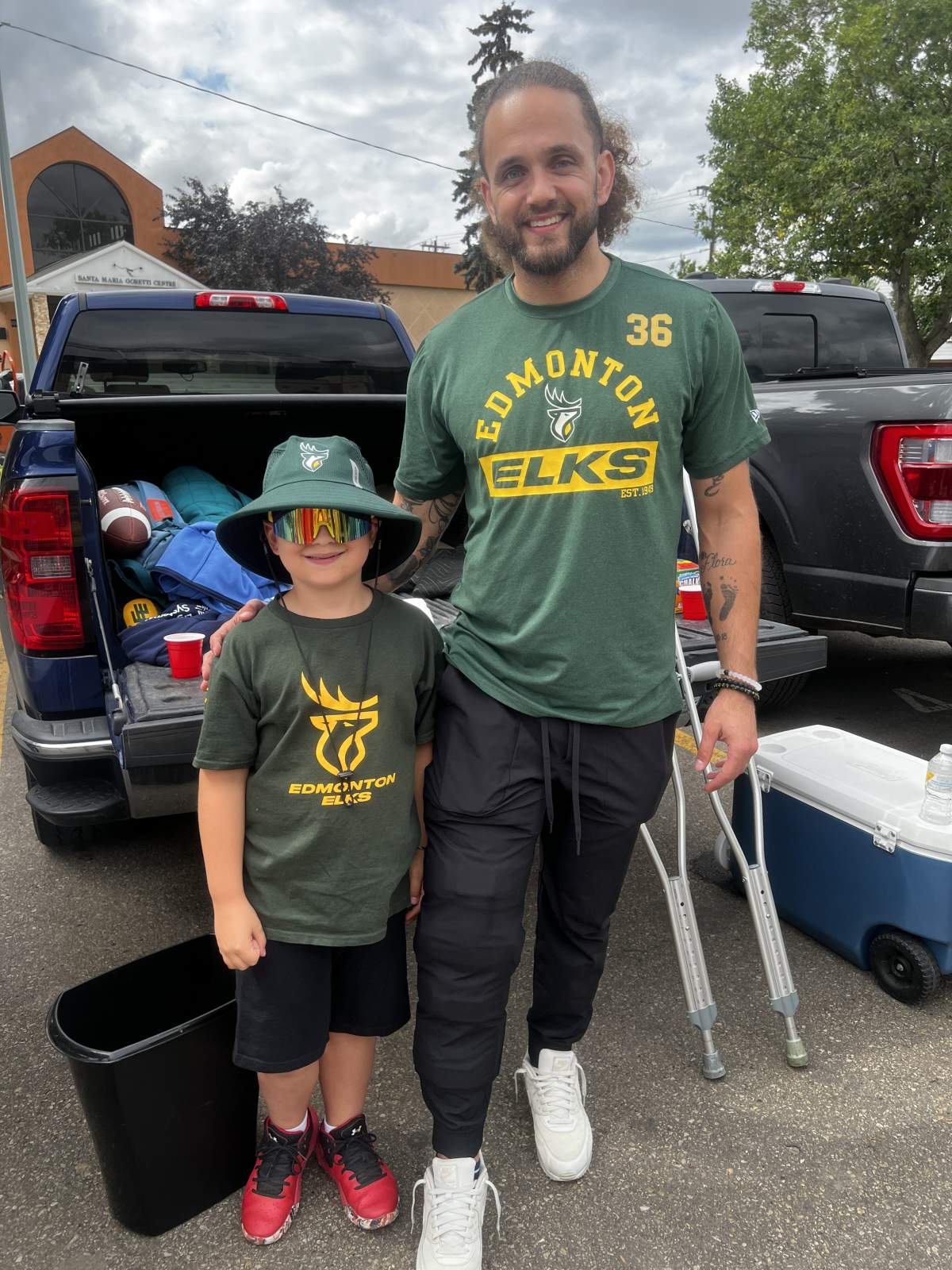 Aaron and Jace at a tailgating event