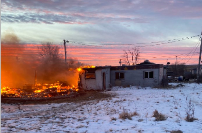 Officers with the Moose Lake RCMP detachment in Manitoba say a fire at a residence in the community destroyed five trailers and damaged a sixth.