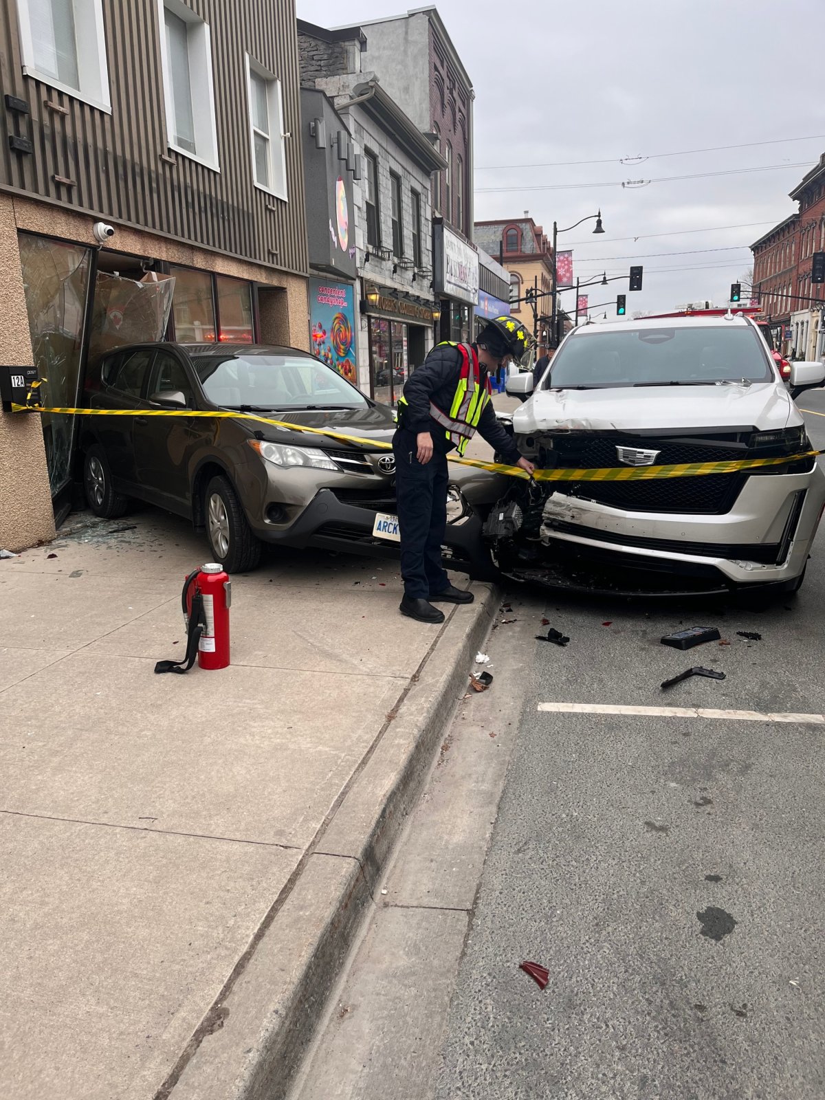 An 87-year-old woman from Odessa has been charged after a vehicle crashed into a building and another vehicle in Napanee on Tuesday.