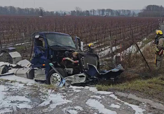 Photo of a tanker truck following a collision OPP say involved three vehicles on South Service Road in Beamsville, Ont. in Niagara Region Jan. 12, 2024.
