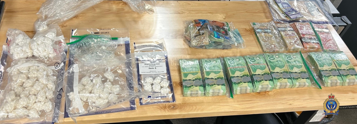 Members of the Regina police charged a 30-year-old man after seizing over $66,000 in cash, fraudulent ID, $85,000 worth of what police believe to be cocaine and other items.