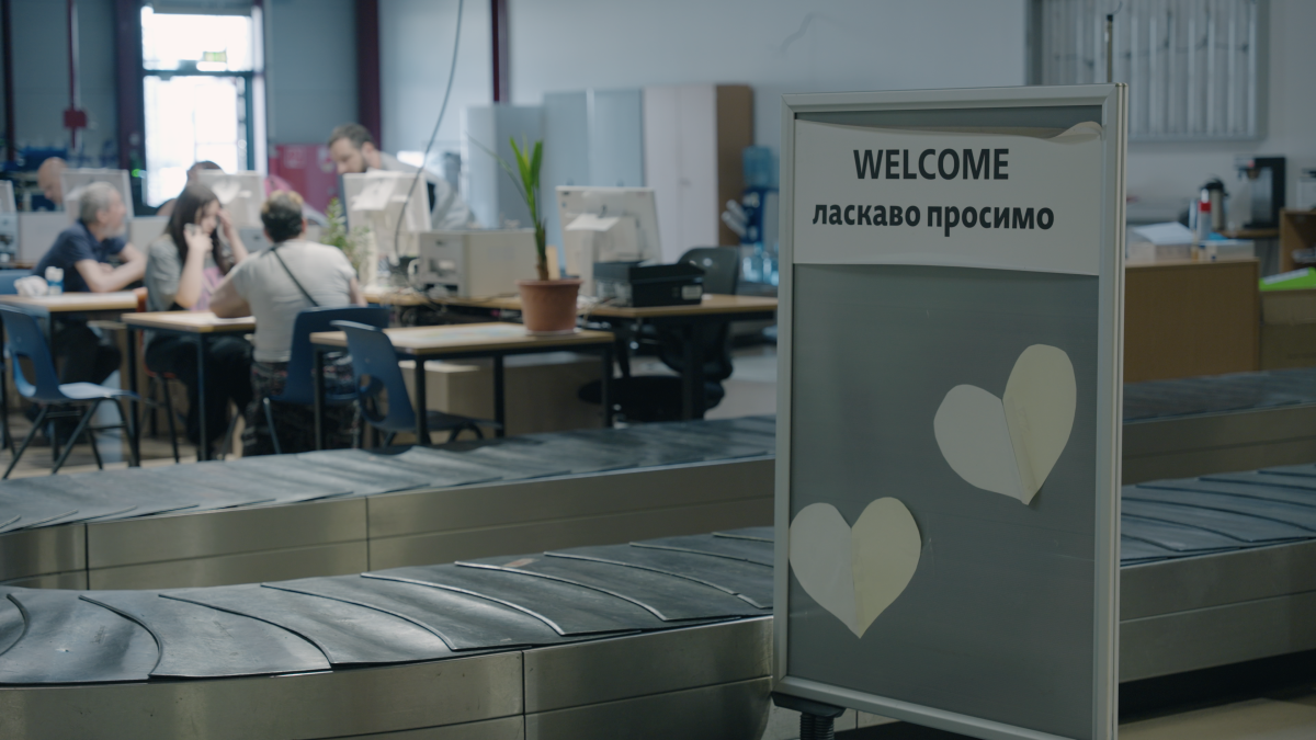 Refugees and asylum seekers register at the Tegel Airport Arrival Centre.