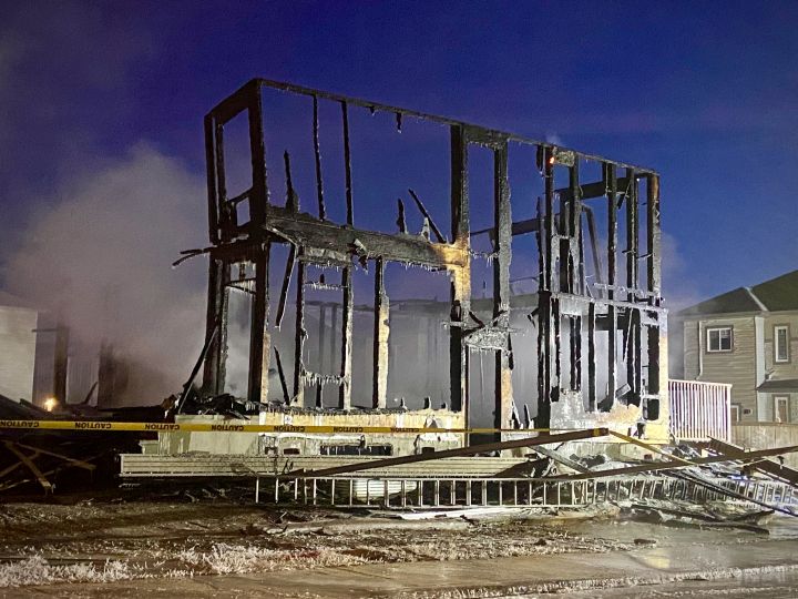 An investigation is underway after a home under construction caught fire in the west Edmonton neighbourhood of Secord on Monday morning.