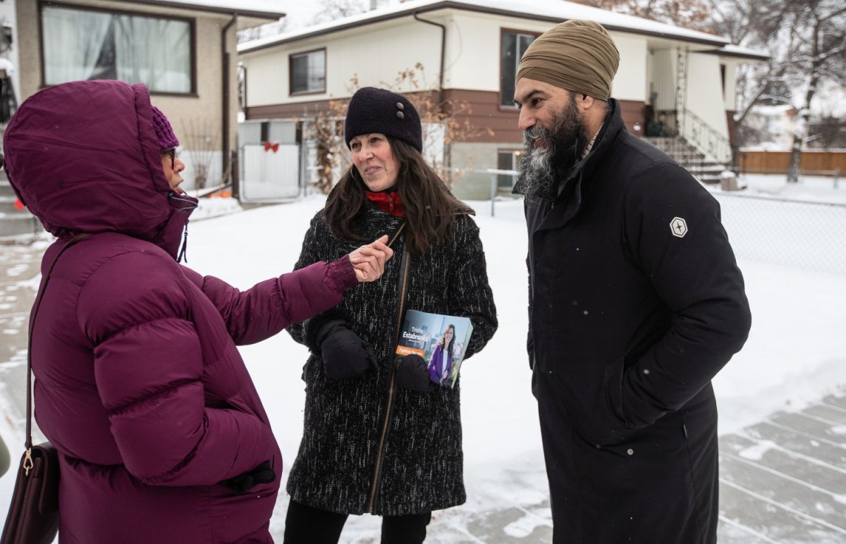 NDP Leader Jagmeet Singh and NDP candidate for Edmonton Centre, Trisha Estabrooks, meet with a supporter on the street while kicking off the NDP caucus retreat by knocking on doors in Edmonton Alberta, on Monday January 22, 2024.