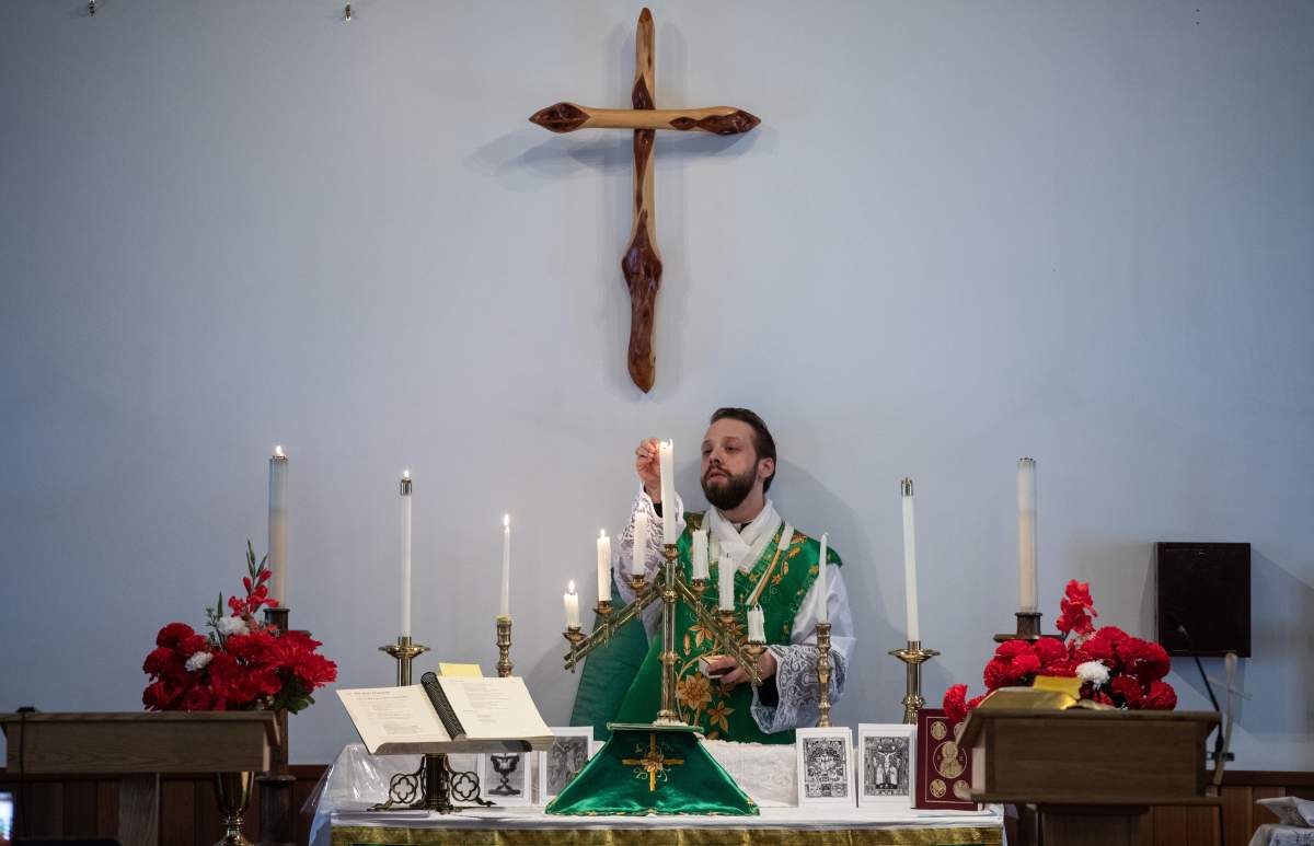 Father Aaron Solberg holds a Sunday service after 6 people were killed in a plane crash on Tuesday, in Fort Smith, N.W.T., Sunday, Jan. 28, 2024.