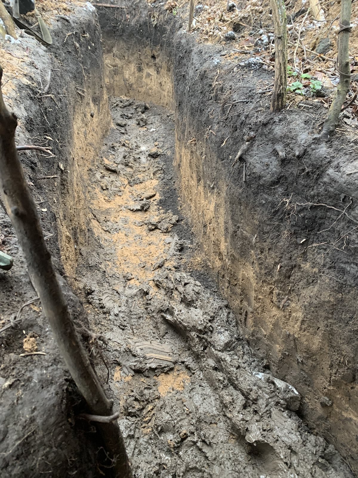 A muddy trench
