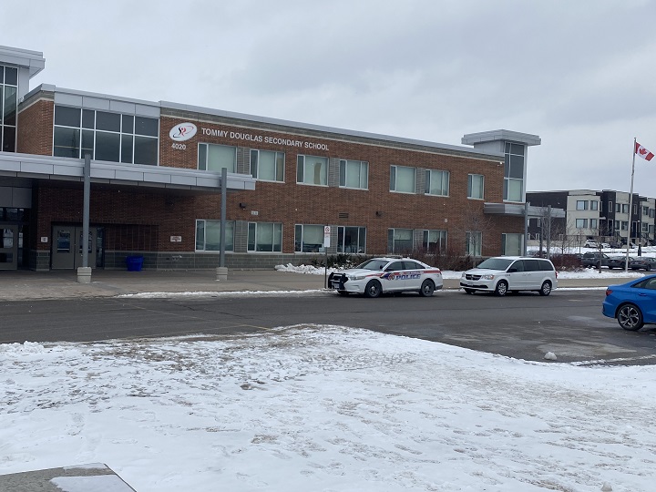 Police at Tommy Douglas Secondary School on Thursday, where it’s believed the victim was a student.