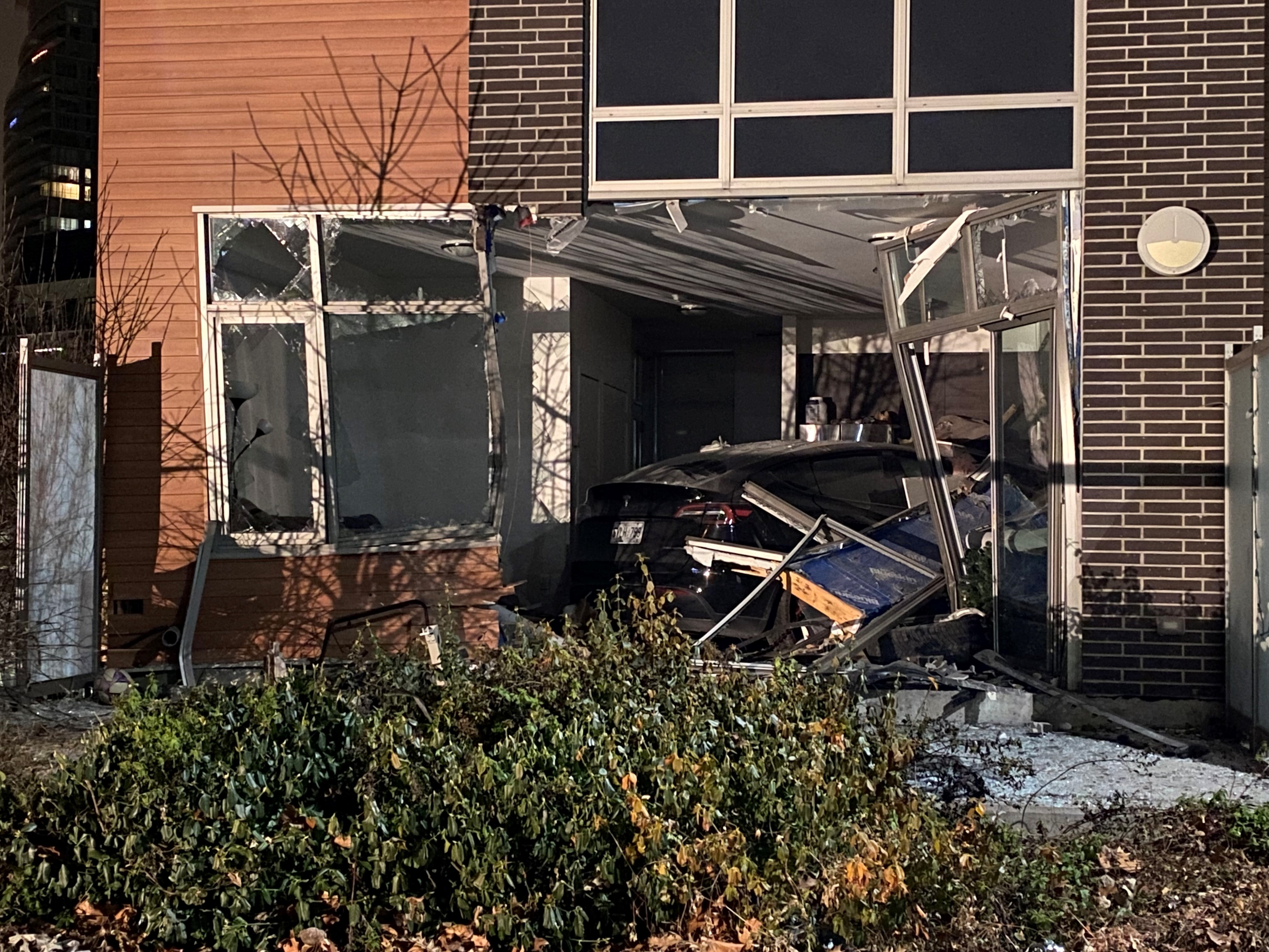 Car drives into Toronto townhouse, multiple people taken to hospital