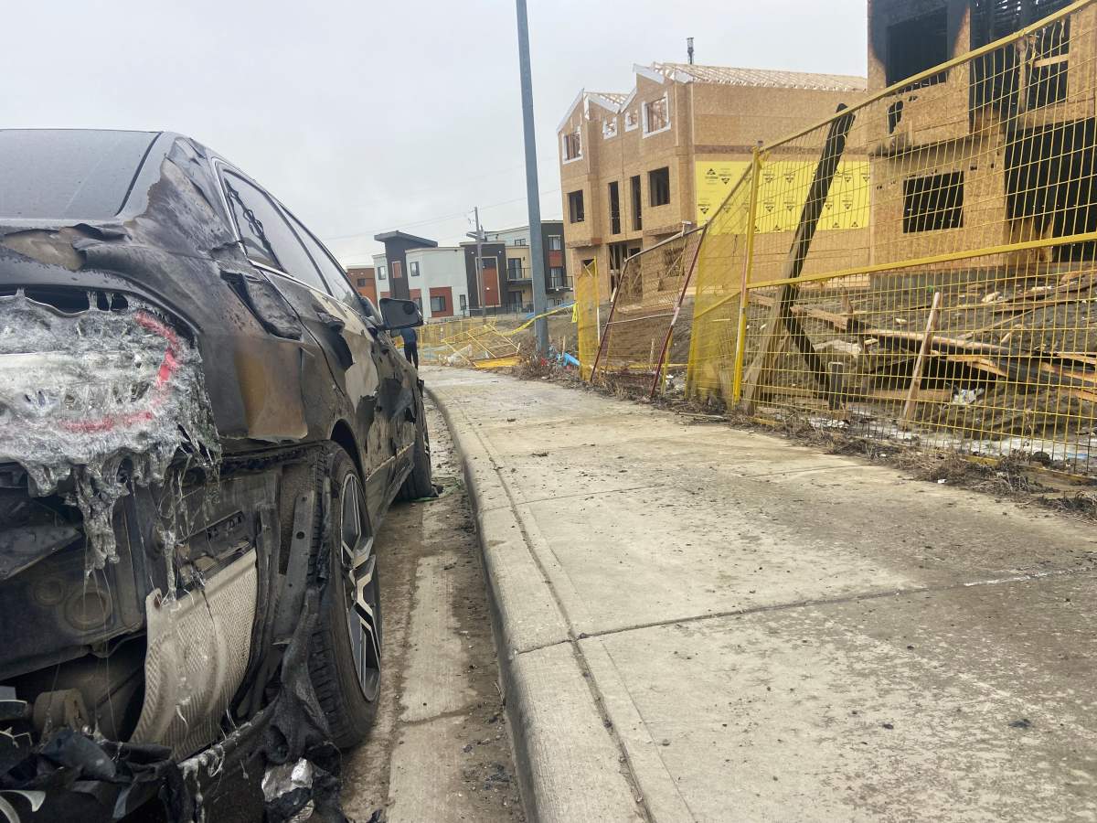 Several nearby vehicles were damaged during the fire.