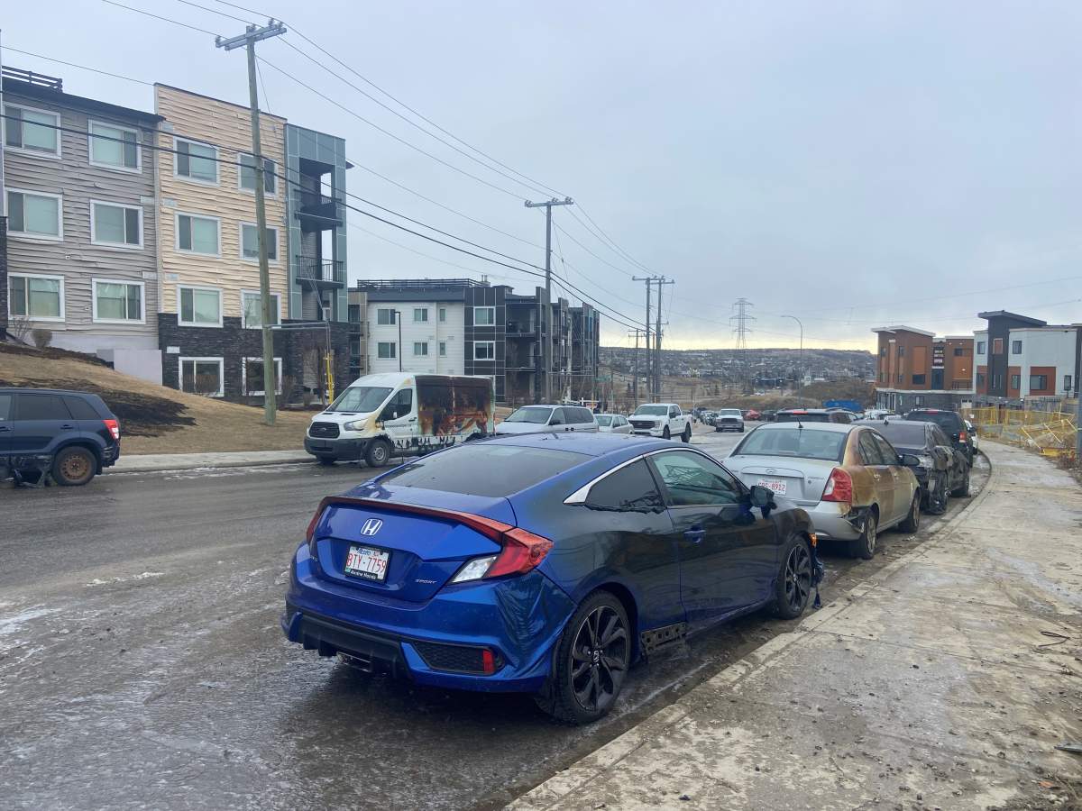 Several nearby vehicles were damaged during the fire.