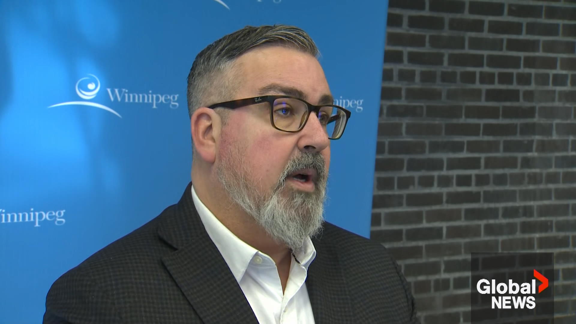 Майкъл Джак който служи като главен административен служител на Уинипег