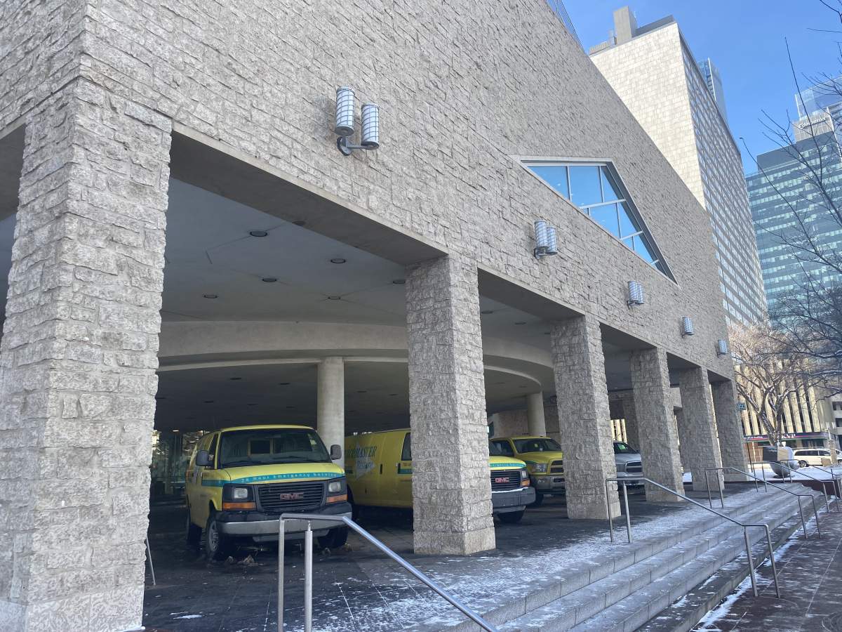Restoration crews at Edmonton City Hall Wednesday, Jan. 24, 2024, one day after a shooting inside the building.