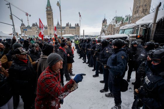 Police move in to clear downtown Ottawa near Parliament hill of protesters after weeks of demonstrations