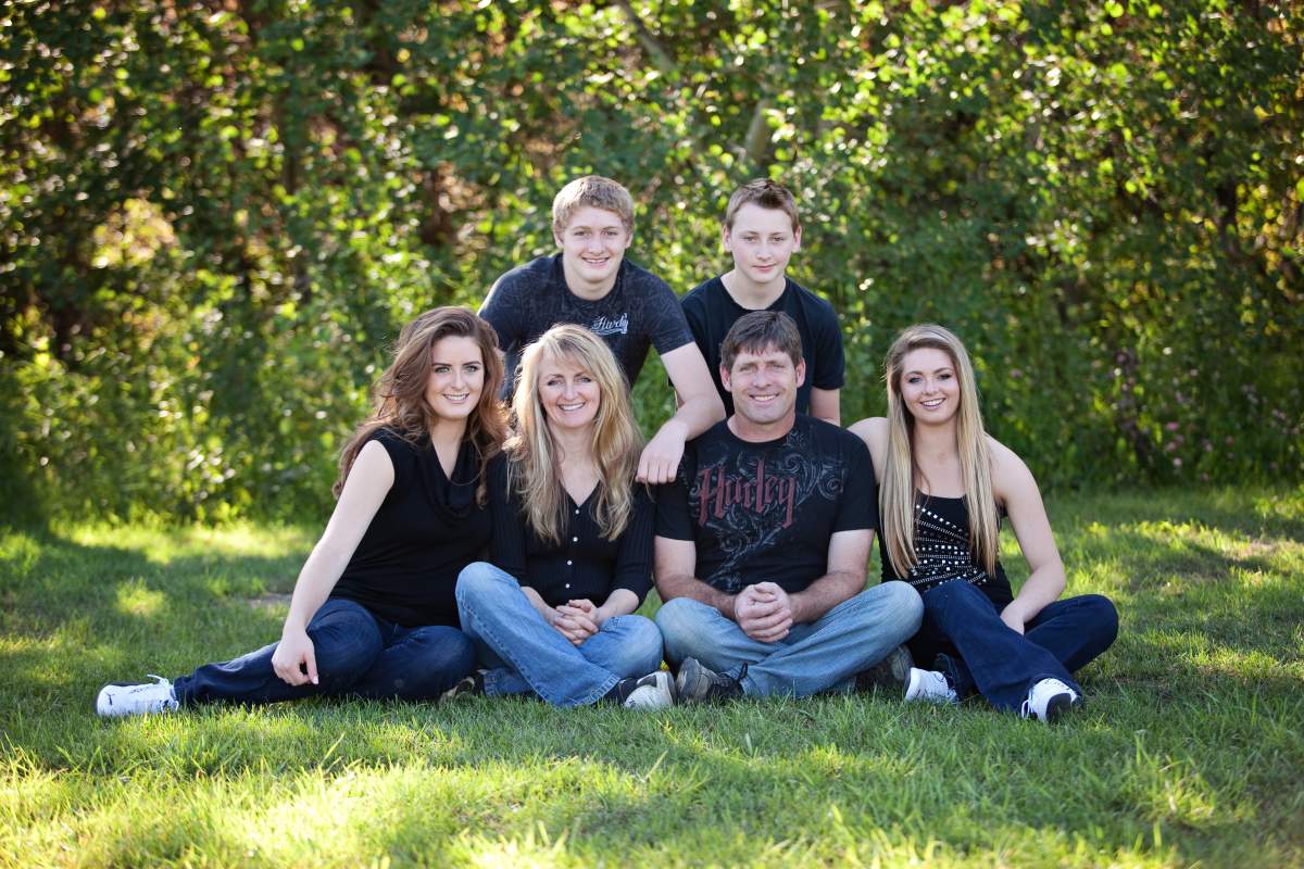 Brock Ruether (back left) and his family.