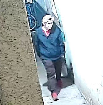 Police have released photos of a man, they describe as a suspect in the case, who was captured on security video in the area. 