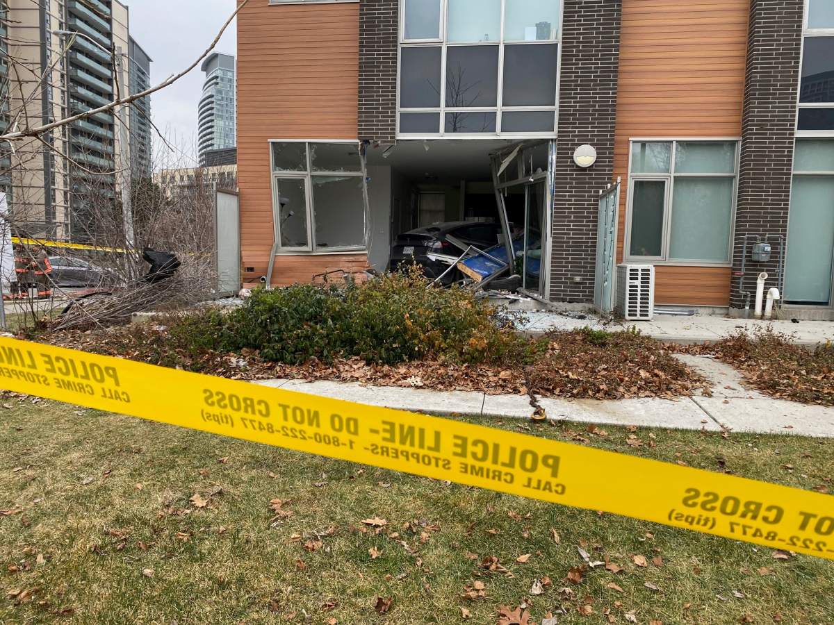 A Tesla crashes into a townhouse in Toronto.