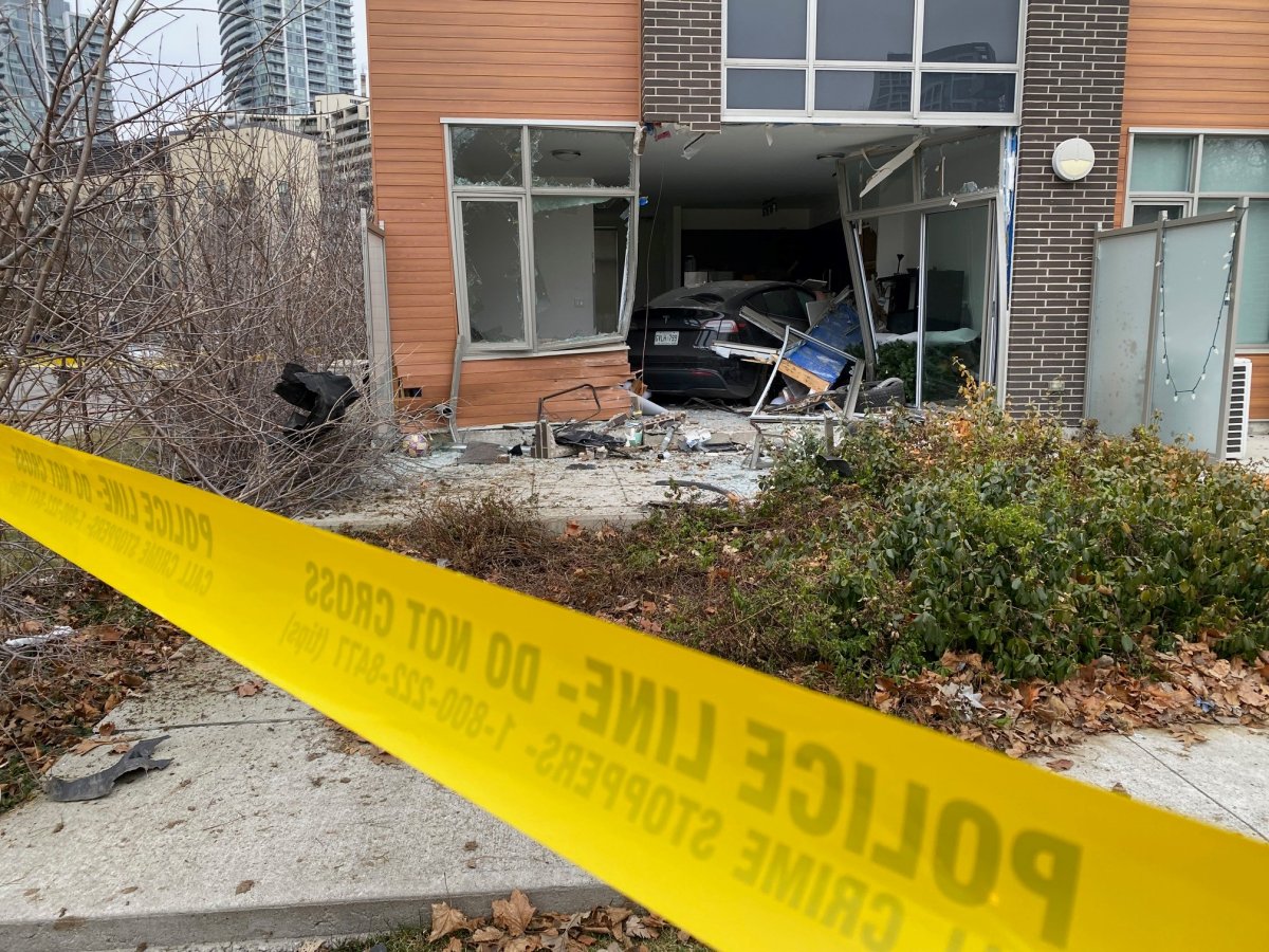 A Tesla crashes into a townhouse in Toronto.