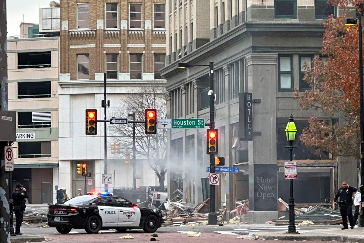 First responders work the scene after an explosion at the Sandman Signature hotel on Monday, Jan. 8, 2024, in Fort Worth, Texas. 