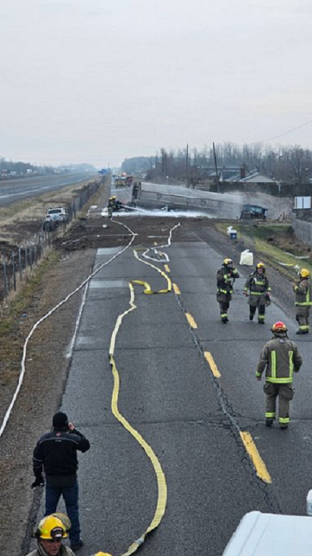 Sections of the QEW will be closed again Saturday morning for cleanup after a collision caused a fuel tanker to roll over Friday.