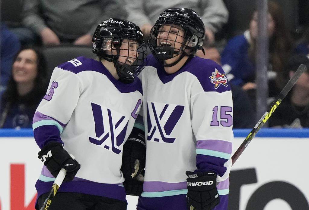 Team King's Kendall Coyne Schofield (26) celebrates a goal with teammate Savannah Harmon (15) as they play against team Kloss during the PWHL 3-on-3 Showcase at the NHL All-Star week in Toronto on Thursday, February 1, 2024.