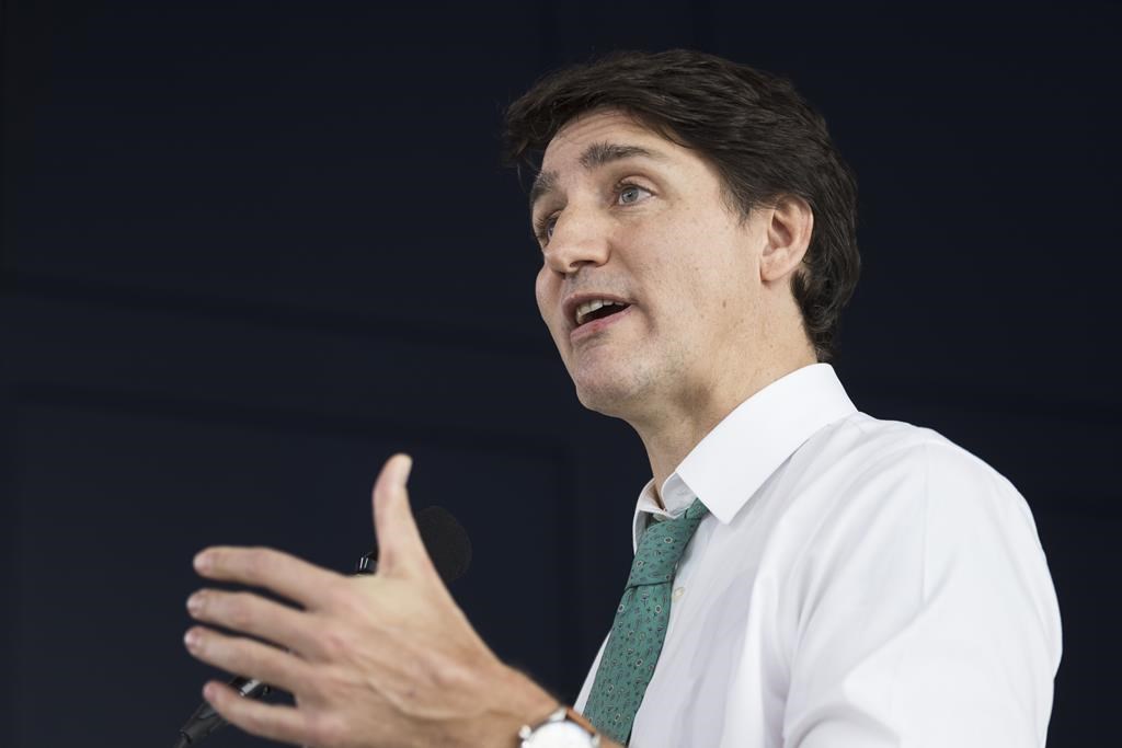 Prime Minister Justin Trudeau is calling Alberta's new proposals on the treatment of transgender youth the "most anti-LGBT of anywhere in the country." Trudeau makes an announcement in Waterloo, Ont. on Friday, Feb. 2, 2024. THE CANADIAN PRESS/Nick Iwanyshyn