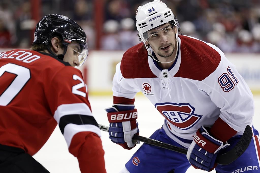 Montreal Canadiens centre Sean Monahan (91) against the New Jersey Devils during the first period of an NHL hockey game on Jan. 17, 2024, in Newark, N.J.