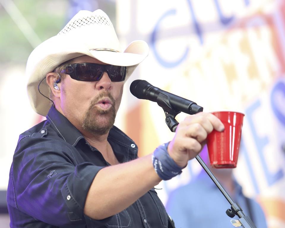 File - Country music recording artist Toby Keith holds a red Solo cup as he performs on NBC's Today show at Rockefeller Plaza on July 5, 2019, in New York. Keith, who died Monday at 62, immortalized the humble plastic cups in his 2011 hit "Red Solo Cup.