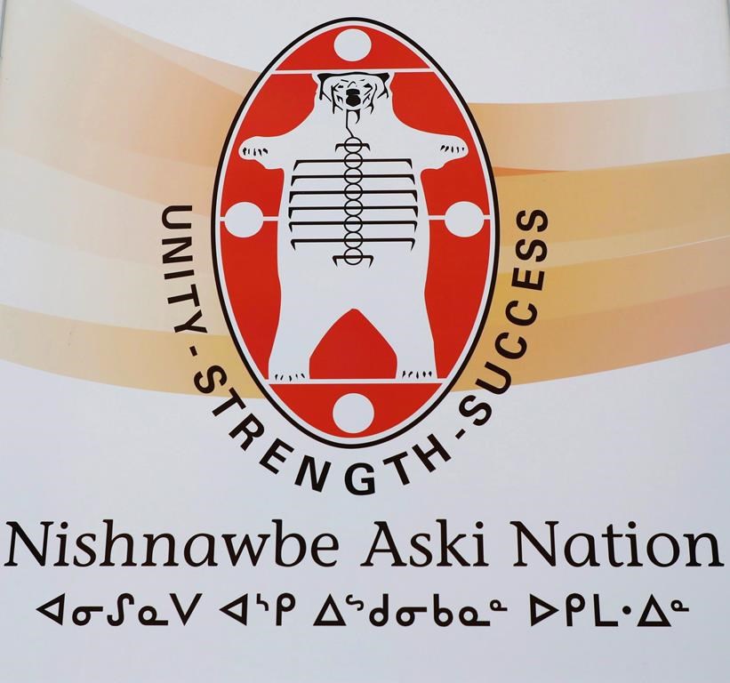 A sign for the Nishnawbe Aski Nation is seen outside the organization's branch office in Timmins, Ont., on Friday, April 20, 2018. An organization representing First Nations across northern Ontario says it is declaring a state of emergency because warmer weather has left some winter roads that its communities rely on for essential goods unpassable. THE CANADIAN PRESS/Colin Perkel.