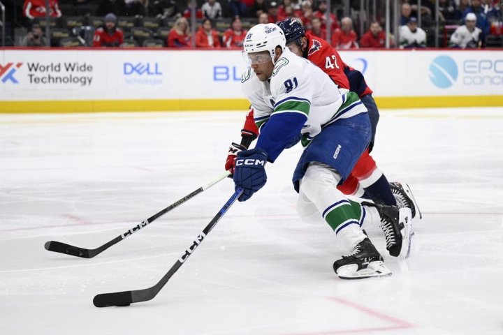 Miller scores with seconds left in OT to help Canucks beat Capitals 3-2