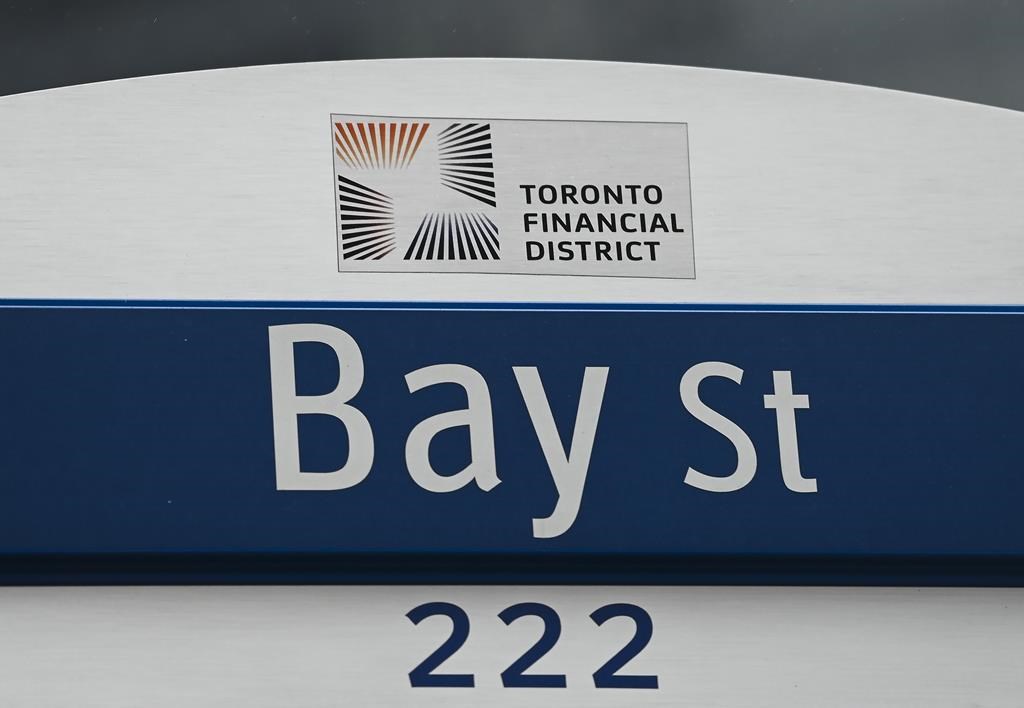 A street sign along Bay Street in Toronto's financial district is shown in Toronto on Tuesday, January 12, 2021. THE CANADIAN PRESS/Nathan Denette.