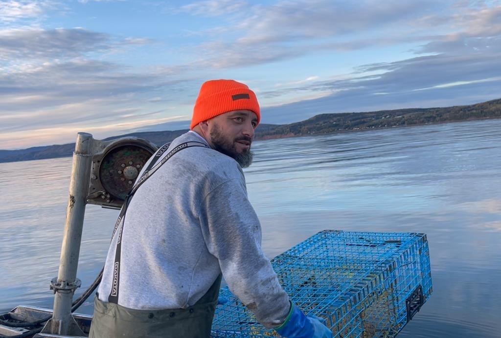 Indigenous fisherman Cody Caplin is shown on a boat in Chaleur Bay, N.B., in an Oct.13, 2023 handout photo. A judge in northern New Brunswick has granted a stay of proceedings in the trial of the Indigenous lobster fisherman who recently launched a constitutional challenge aimed at asserting his Indigenous and treaty rights to fish whenever he wants.