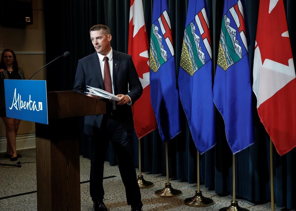 Alberta Finance Minister Nate Horner arrives to speak to the media at a news conference in Calgary, Thursday, June 29, 2023. Albertans will have to wait until the fall before they learn what the federal government thinks they should get if the province quits the Canada Pension Plan. THE CANADIAN PRESS/Jeff McIntosh