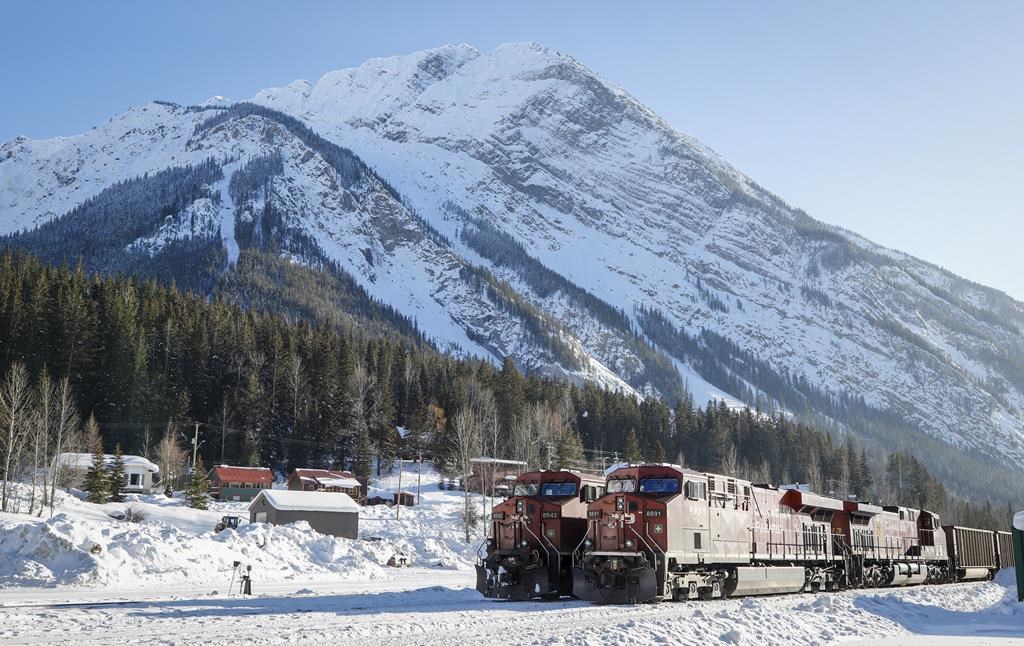 Eastbound trains wait in Field, B.C., for the line to be cleared following a derailment, on Monday, Feb. 4, 2019. Investigators from the Transportation Safety Board of Canada were deployed Saturday to the site of a train derailment near Field, B.C., close to the British Columbia-Alberta border. THE CANADIAN PRESS/Jeff McIntosh
