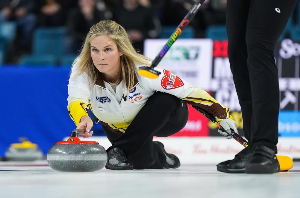 Manitoba's Jennifer Jones opened her 18th and final Scotties Tournament of Hearts with a 7-5 victory Saturday over Nova Scotia's Heather Smith.