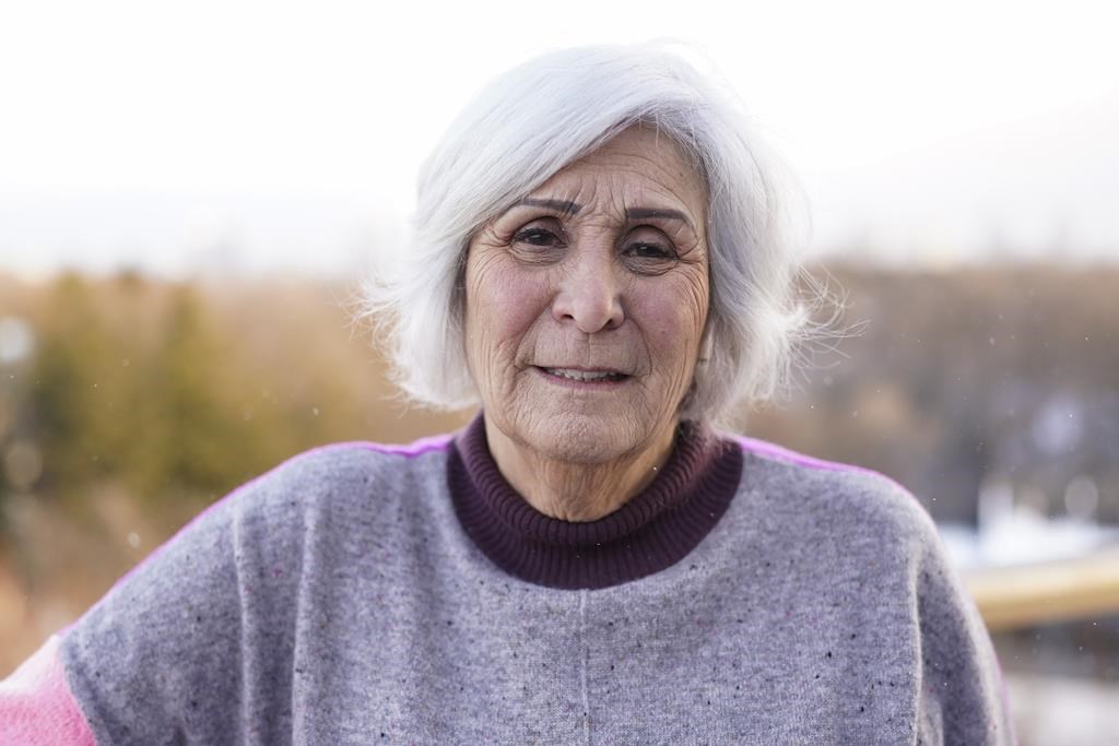 Gail Bocknek poses for a portrait at her home in Toronto on Sunday, Feb. 18, 2024. The Toronto woman whose family unknowingly employed an alleged Nazi war criminal for decades says Canada still doesn't do enough to keep people with problematic pasts out of this country. THE CANADIAN PRESS/Arlyn McAdorey.