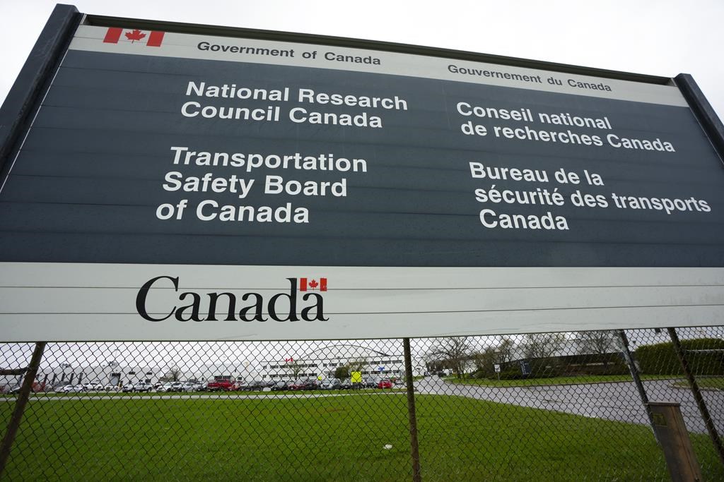 Transportation Safety Board of Canada (TSB) signage is pictured outside TSB offices in Ottawa on Monday, May 1, 2023. A flight heading from Toronto to New York City earlier this month had to turn around because of a "burnt electrical smell" in the cockpit. THE CANADIAN PRESS/Sean Kilpatrick.