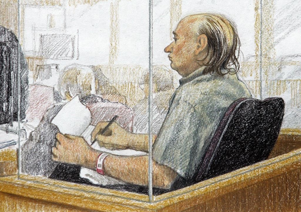 An artist's sketch shows accused serial killer Robert Pickton taking notes during the second day of his trial in B.C. Supreme Court in New Westminster, B.C., Tuesday January 31, 2006.