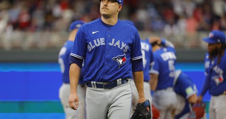 Blue Jays reliever Swanson tends to injured son