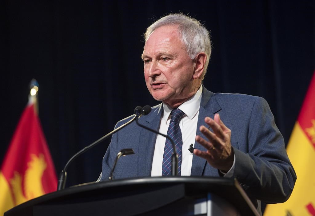 A promise from New Brunswick Premier Blaine Higgs to put cash in people's pockets ahead of a fall election is prompting blowback. Higgs delivers the state of the province speech in Fredericton on Thursday, January 25, 2024. THE CANADIAN PRESS/Stephen MacGillivray.