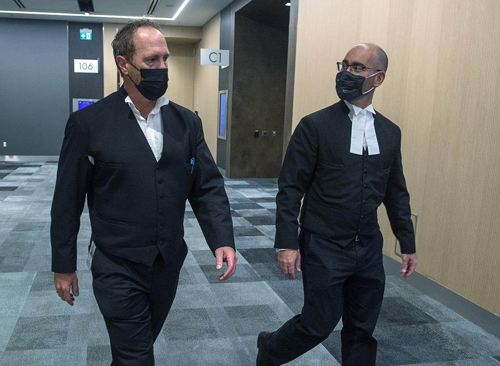 Crown prosecutors Rick Woodburn, left, and Scott Morrison are shown at the convention centre in Halifax on Wednesday, Sept. 22, 2021. Nova Scotia's Crown prosecutors were handed new tools today to combat systemic anti-Black racism long embedded within the province's justice system. 
