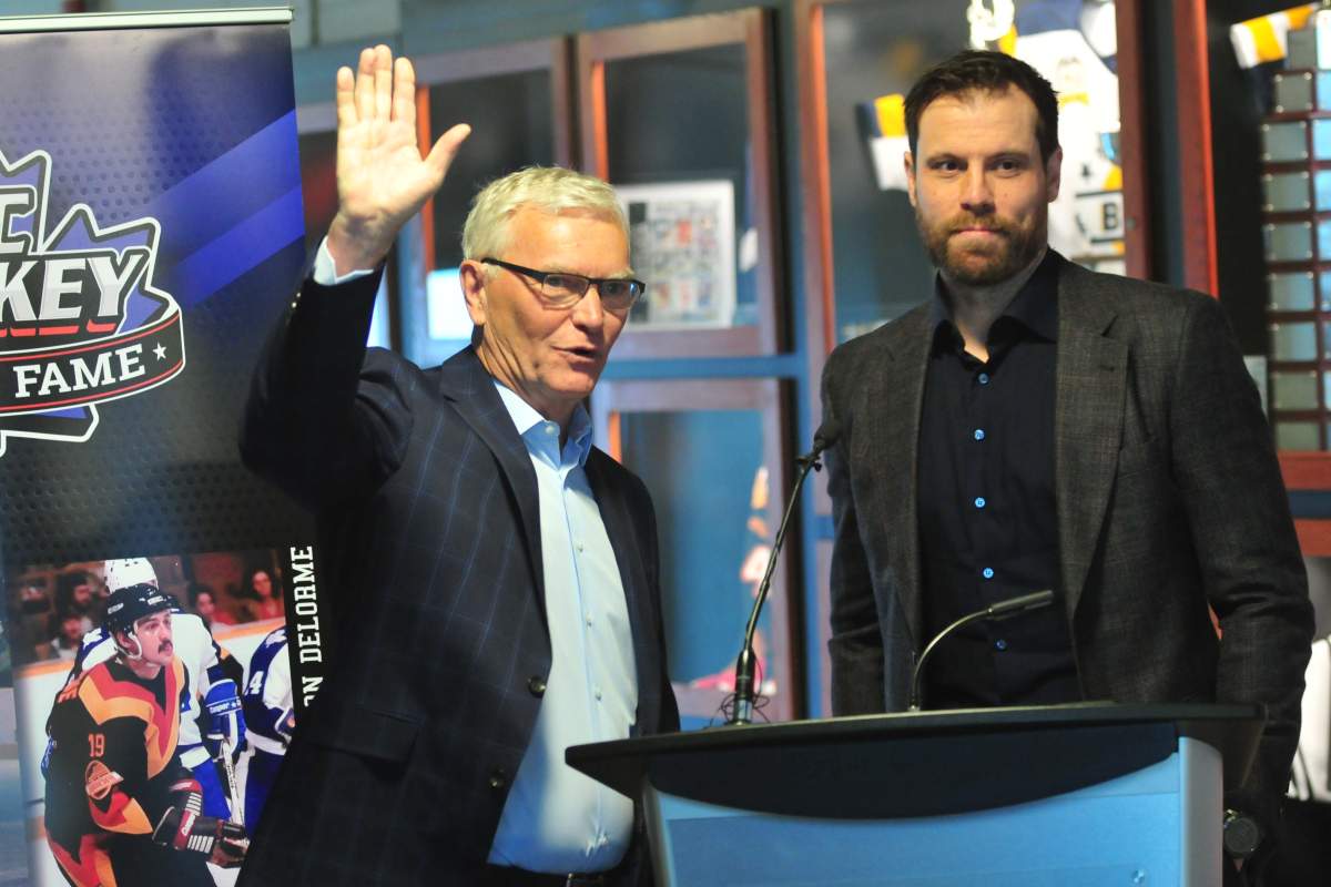 B.C. Hockey Hall of Fame chair Jim Hughson, left, introduces former NHLer Shea Weber during the hall’s class of 2024 announcement in Penticton, B.C., on Thursday, Feb. 29, 2024.