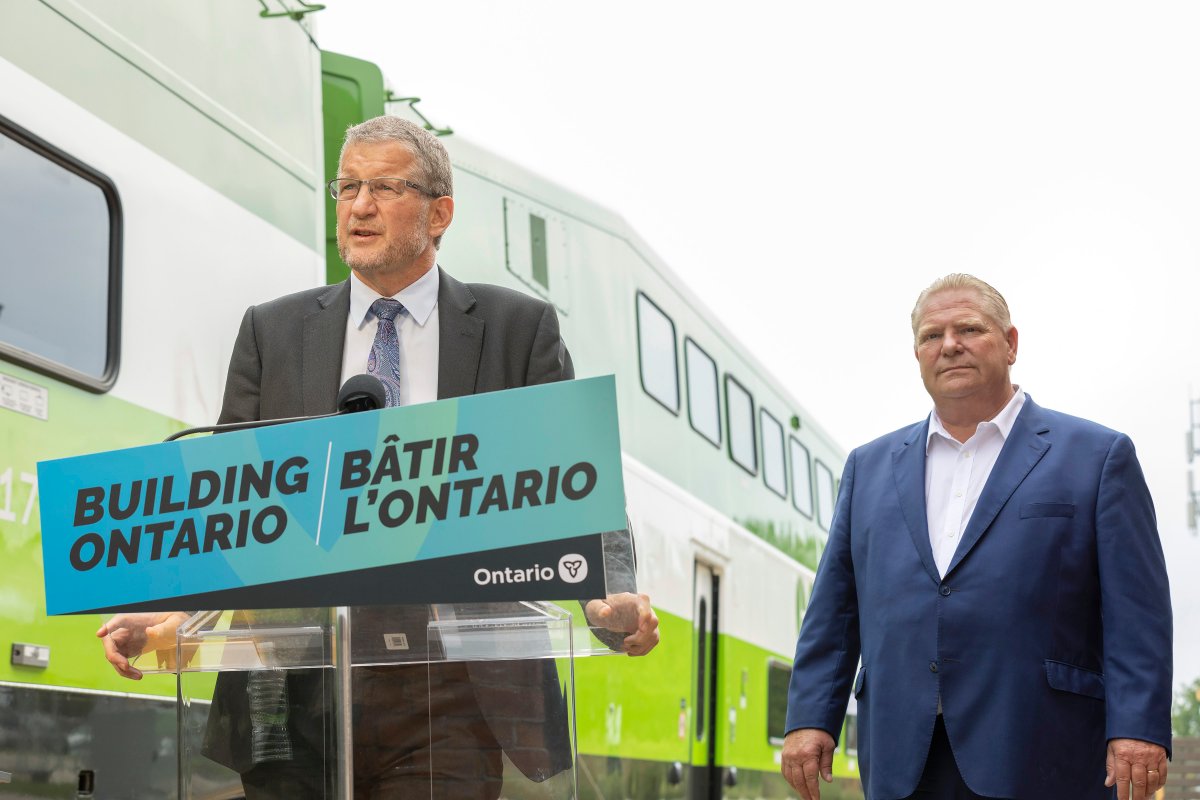 Metrolinx president and CEO Phil Verster joins Ontario Premier Doug Ford in making a GO transit announcement in Niagara Falls, Ont., Friday, Aug. 26, 2022.