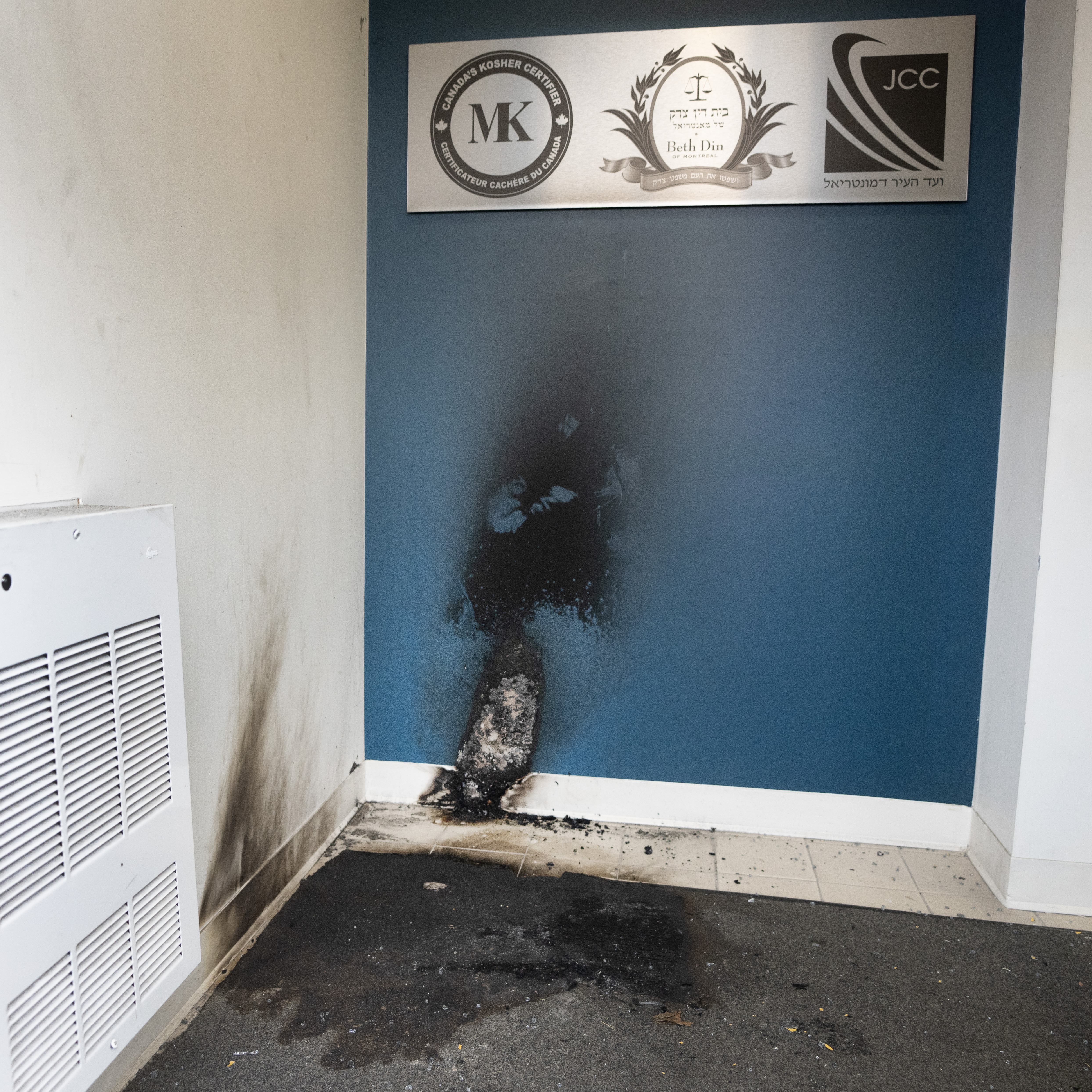 Damage caused by incendiary device thrown at Jewish community centre in Montreal, Nov. 27, 2023.THE CANADIAN PRESS/Ryan Remiorz