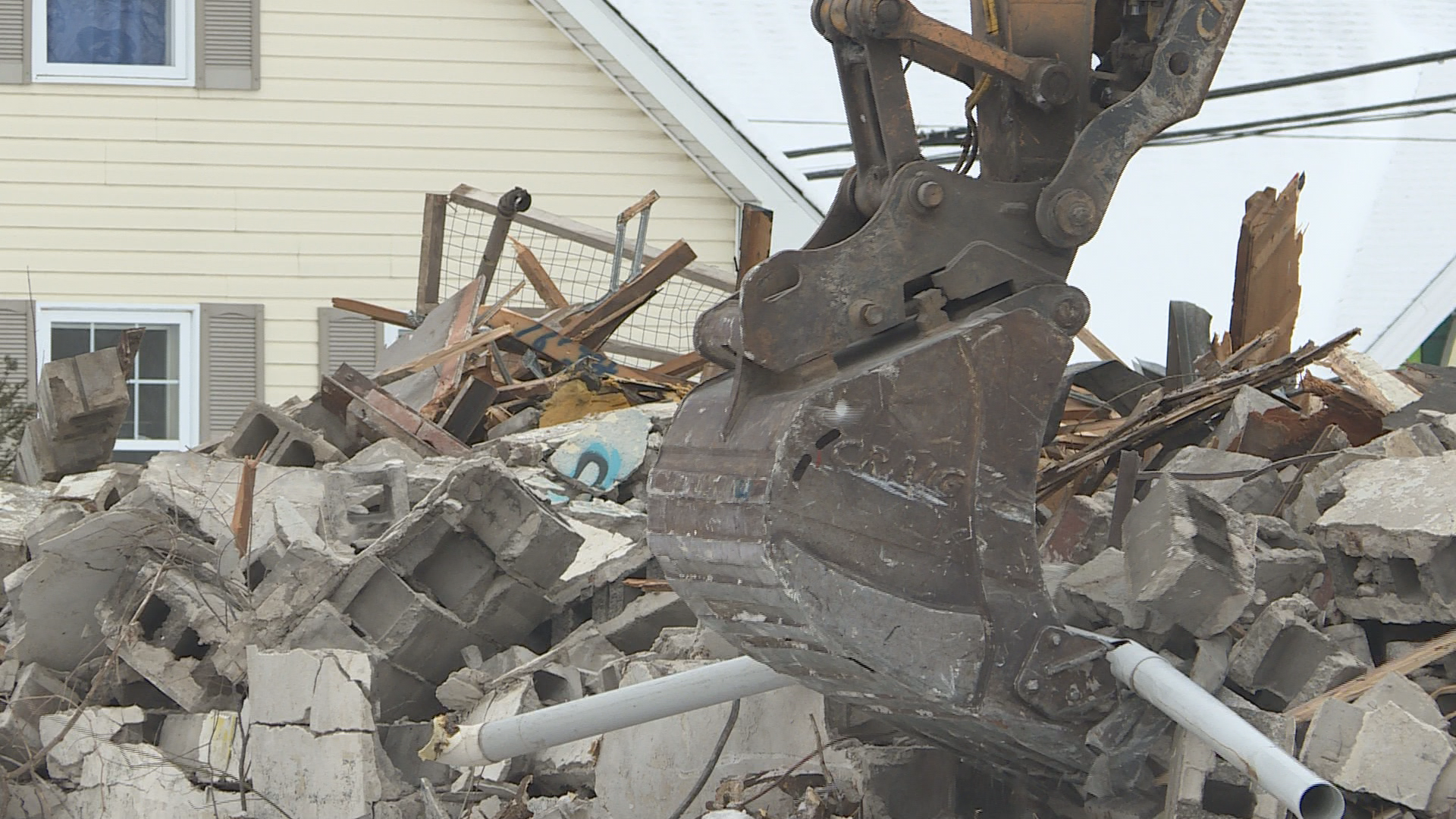 ‘A good day’: Dilapidated Fredericton gas station demolished with plans to revive site