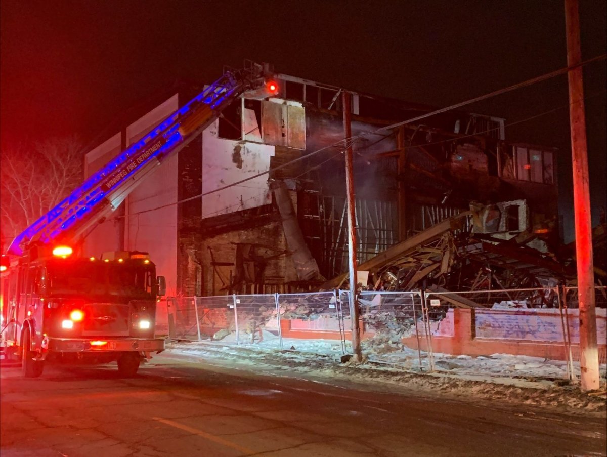 Winnipeg firefighters battling a blaze at a vacant warehouse on Sunday, Feb. 25, 2024.