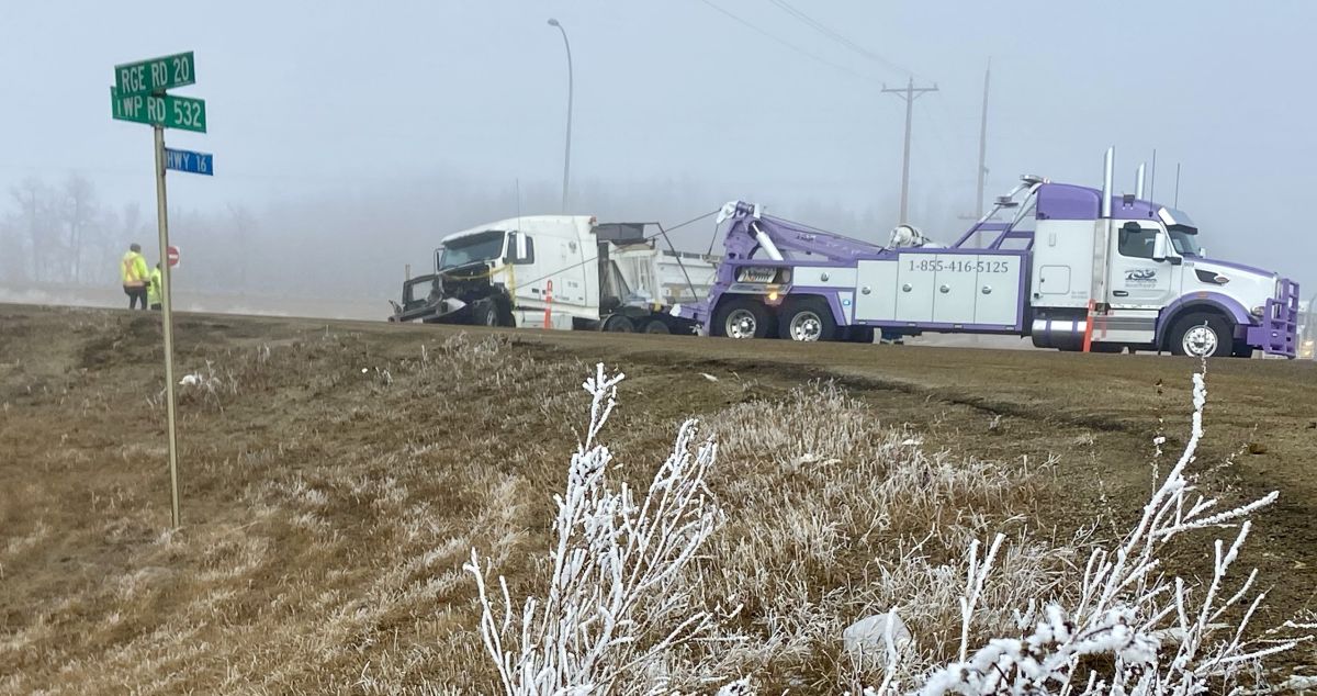 Crews work to cleanup after a crash in central Alberta on Feb. 21, 2024.