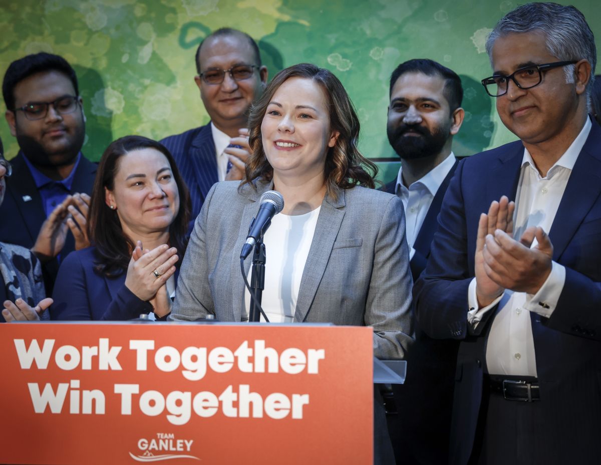 Alberta NDP MLA Kathleen Ganley, centre, announces she is running for the leadership of the party in Calgary, Monday, Feb. 5, 2024.
